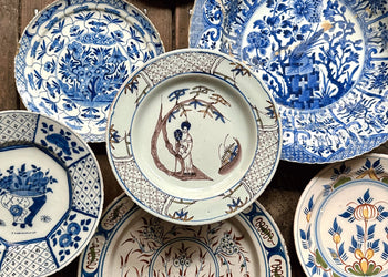 Group of antiques on table