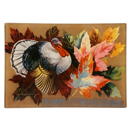 A turkey with autumn leaves with the text 'A Happy Thanksgiving' written on the bottom.