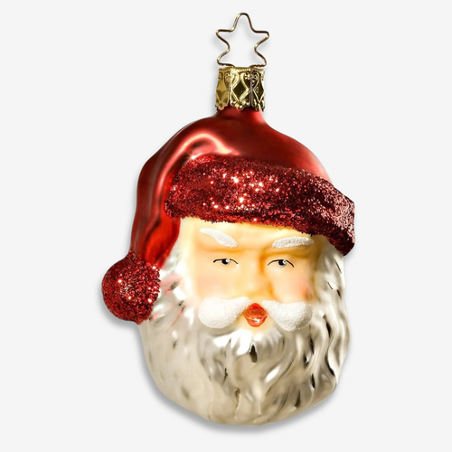 A Santa Claus Christmas ornament with a glossy red hat, glittery red brim, and textured white beard, shown against a light gray background.