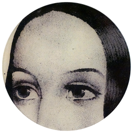 A ten inch round glass plate featuring a black and white illustration of a woman's eyes. 