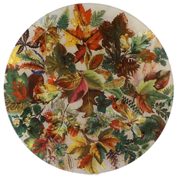 An eleven inch round glass plate featuring an all-over autumn leaf pattern in shades of orange, red, yellow, green, and brown on a light cream background.