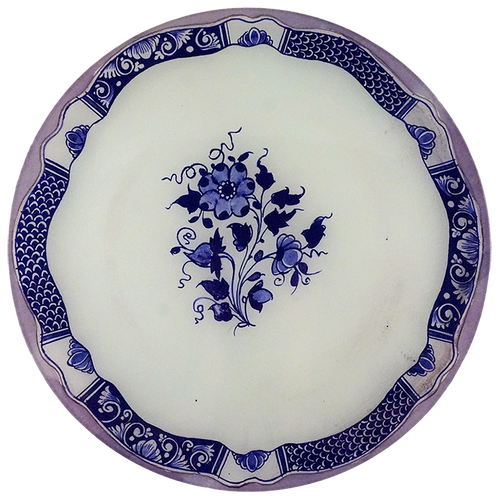A 13-inch round glass plate featuring a blue sketch in the center of a white background and intricate blue boarder design. 