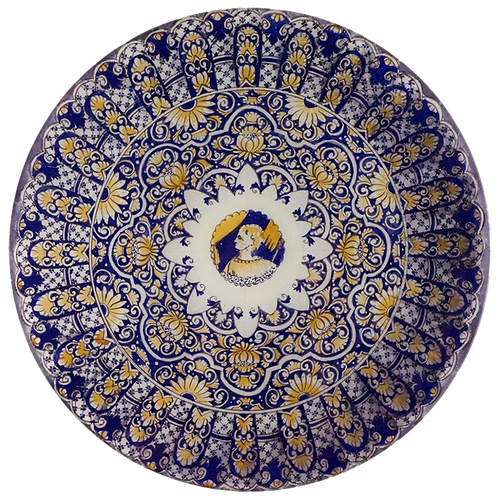 A 13-inch round glass plate featuring an intricate blue and yellow design with a woman in the center. 