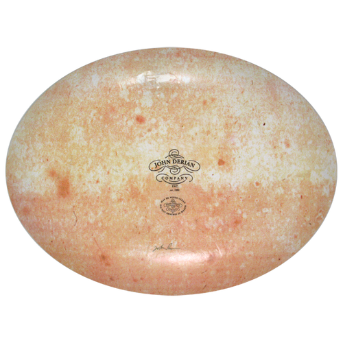The back of a fourteen inch by nineteen inch oval plate with the John Derian logo, sticker and signed by John Derian. 