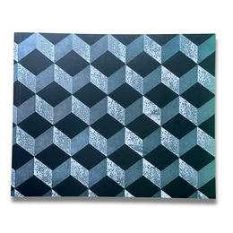 A rectangular notebook with a printed cover featuring a 3D optical illusion geometric pattern of cubes in shades of dark teal, navy, and textured silver-gray, shown against a plain white background.