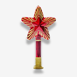A red and gold star tree topper with a glittery gold base, shown against a light gray background.