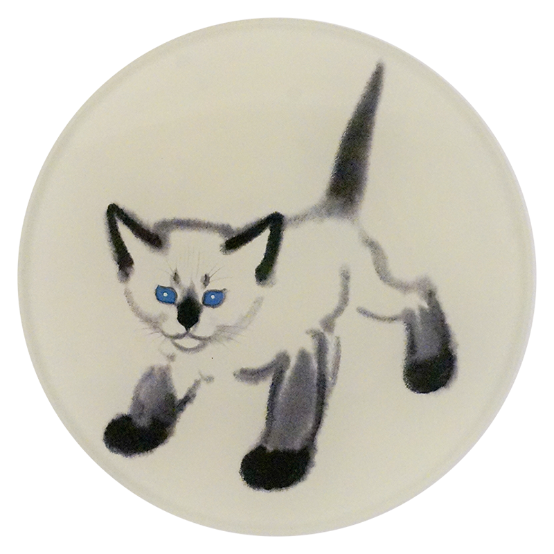 A four inch round plate featuring sketch of cat with tall up and blue eyes on a white background