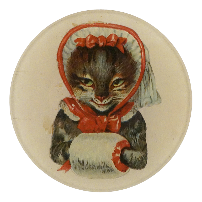 A round four inch round plate featuring an illustration of a cat dressed in a red bonnet and bow, holding a white roll, on a cream-colored background.
