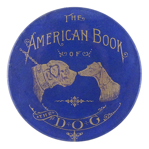 A blue four inch round plate featuring gold-toned vintage typography reading 'The American Book of the Dog' with illustrated dog portraits facing each other.
