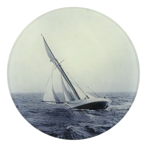 A five inch round plate featuring a vintage sailing yacht on blue ocean waves under a pale sky, shown against a plain white background