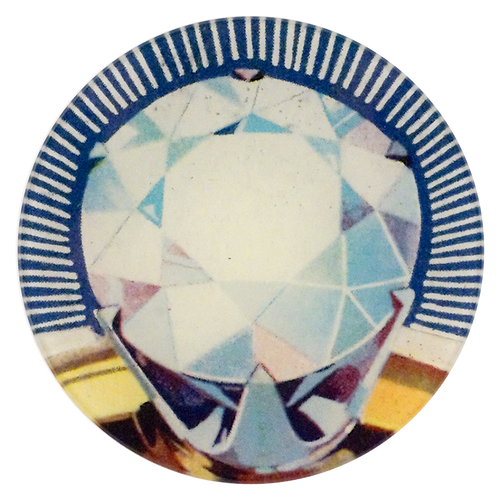A five inch round handblown glass plate featuring a central diamond ring and blue border.