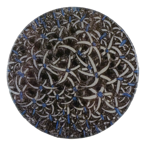 A five inch round decorative plate with a floral pattern, featuring a combination of brown, blue, and white colors.