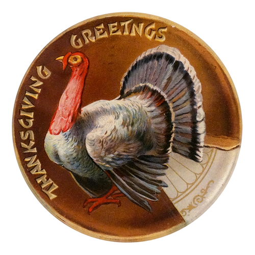 A five inch round glass plate of a turkey on a pie with a slice cut out. "Thanksgiving Greetings" is written on the left edge in gold font. 