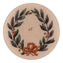 A five inch round glass plate feathering a green wreath with cherries and a red bow. The number 15 shown in the center