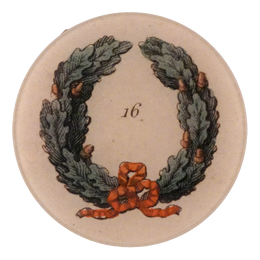 A five inch round glass plate featuring an illustration of a wreath with acorns and a red bow. The number 16 is shown in the center