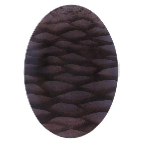 A seven inch by ten inch oval glass plate with a dark brown textured wood-grain pattern.