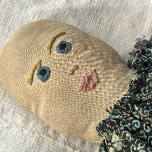 19th-century Doll with Embroidered Face