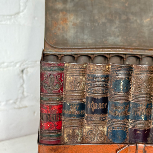 Late 19th-century English Faux Book Stack Biscuit Tin