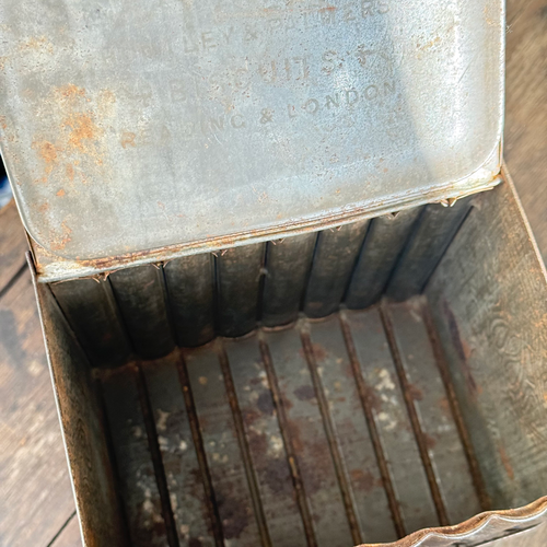 Late 19th-century English Faux Book Stack Biscuit Tin