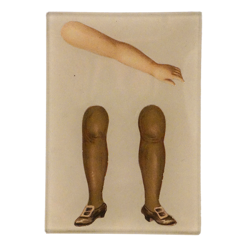 A three and a half inch by five inch rectangular glass tray featuring a vintage-style illustration of an arm and legs with shoes, set against a plain white background.