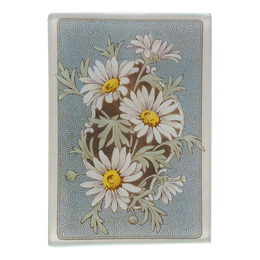 An illustration of white daisies on a green stems with a blue back ground on a three and a half inch by five inch glass tray. 