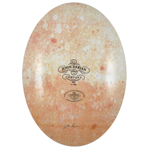The back of a ten inch by fourteen inch vertical glass plate with the John Derian Company logo and sticker signed by John Derian.  