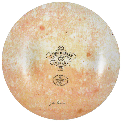 The back of an 11-inch round plate  featuring the signature John Derian Company sticker and signed by John Derian. 