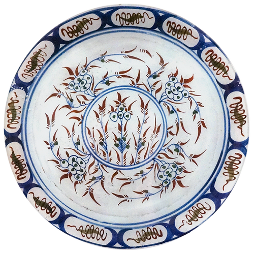 A13-inch round glass plate with blue, white, and brown floral patterns on a white background.