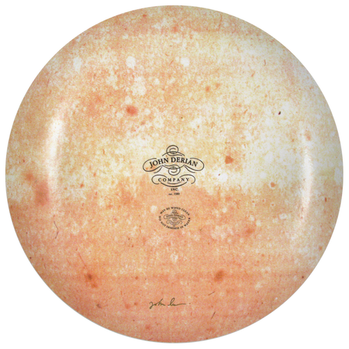 The back of an 16-inch round plate  featuring the signature John Derian Company sticker and signed by John Derian. 