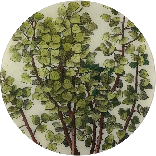 A 16-inch round glass plate with a leafy green branch design.