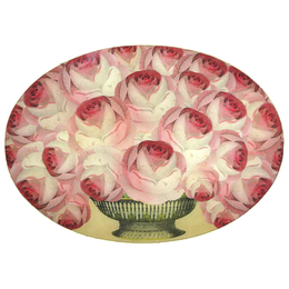 A thirteen inch by eighteen inch horizontal oval glass plate featuring a bundle of pink roses in a vintage style vase. 