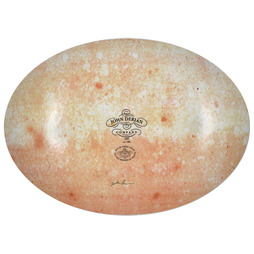 The back of a thirteen inch by eighteen inch oval plate with the John Derian logo, sticker and signed by John Derian. 