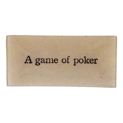 Text reading 'A game of poker' on a three and a half inch by seven inch glass tray. 
