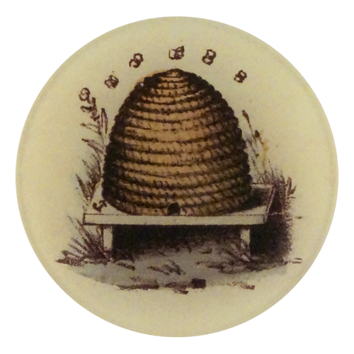 A four inch round handmade decoupage plate featuring an illustration of a bee hive with 5 small bees above 