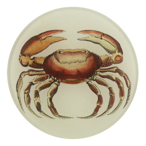 A four inch round handmade decoupage plate of a red crab