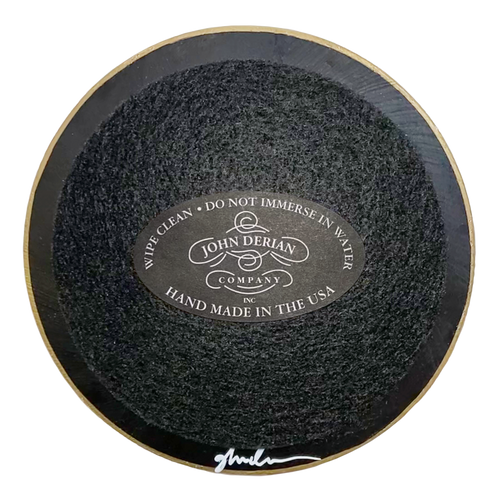 Back of four inch round plate with black paint, black felt and a gold trim. Featuring John Derian Company sticker and signature 
