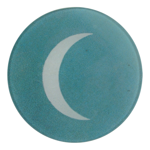 A five inch round blue glass plate with a white crescent moon din the center.