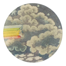 A five inch round glass plate featuring a rainbow going into clouds. 