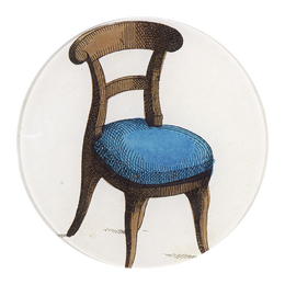 A five inch round glass plate featuring an illustration of a chair with a blue cushion.
