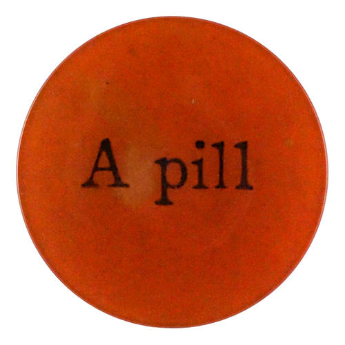 A five inch round red glass plate with the text 'A Pill' in a stylized font.