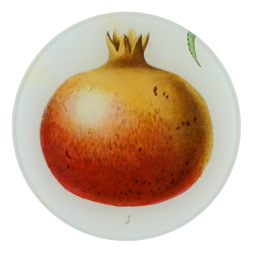 A five inch round glass plate featuring a handblown glass with a collaged paper image of a pomegranate.