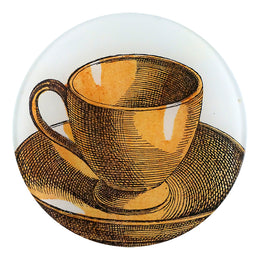 A five inch round glass plate featuring brown and white cup with saucer decoupage on glass, inspired by an illustrated book.