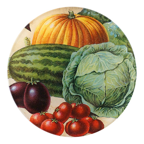 A five inch round glass plate featuring a harvest of pumpkin, squash, cabbage, eggplant and tomatoes. 