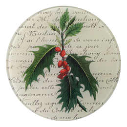 A five inch round glass plate with a collage of holly leaves and berries on a background with text.