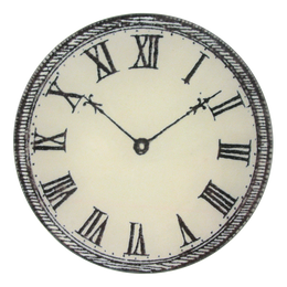 A five inch round glass plate clock with a white face, black hands and black Roman numerals, with a vintage-style design.