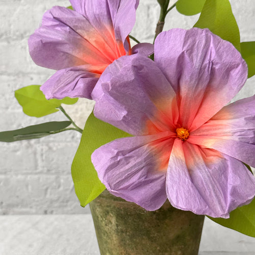 Colorful paper flowers in pot detail