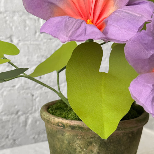 Colorful paper flowers in pot detail