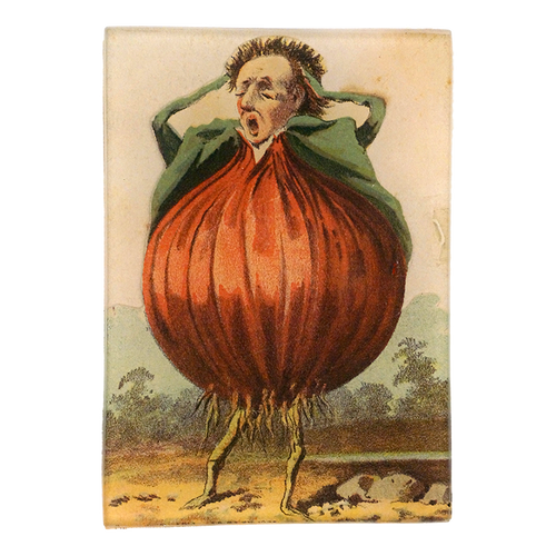 A stylized onion with a human face, collar, and a background of a field and sky on a three and a half inch by five inch glass tray. 